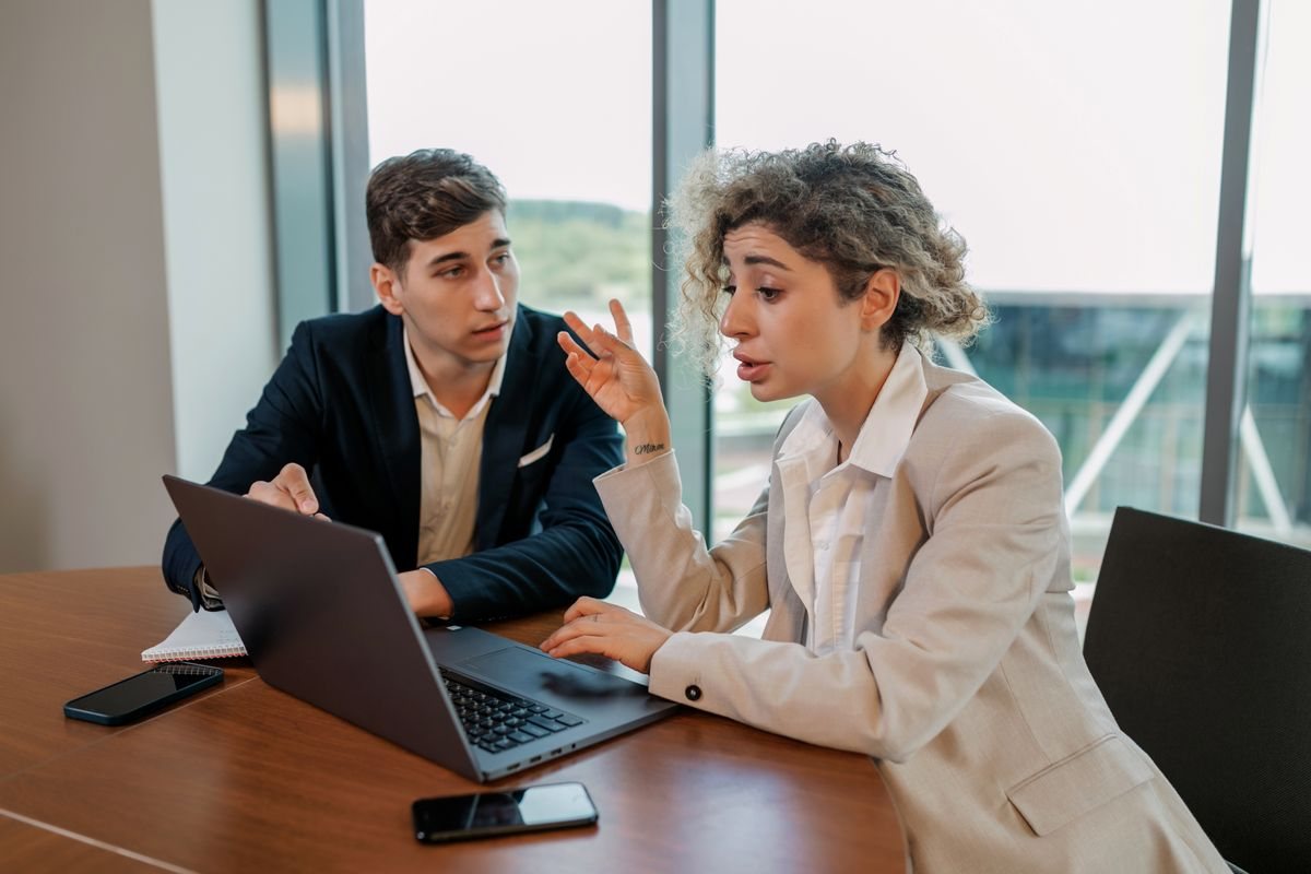 Two people sharing a device at home